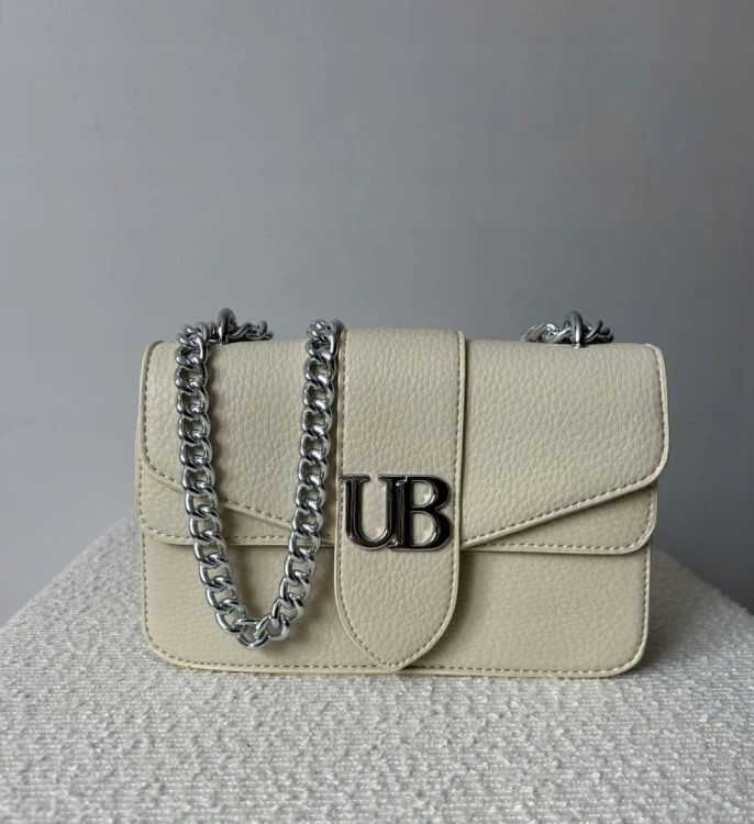 Beżowa mała torebka na ramię ze srebrnym łańcuszkiem Unibella